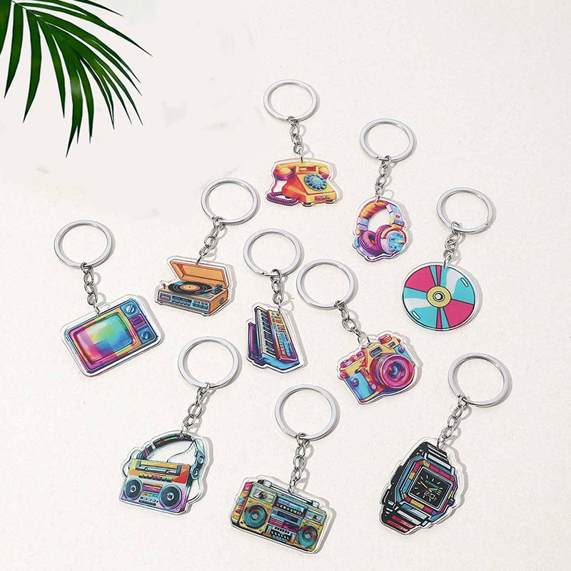 Ensemble de porte-clés en acrylique rétro vintage avec des designs électroniques classiques
